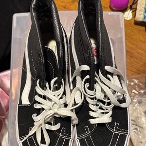 Vans Women's Black and White High-Top Sneakers